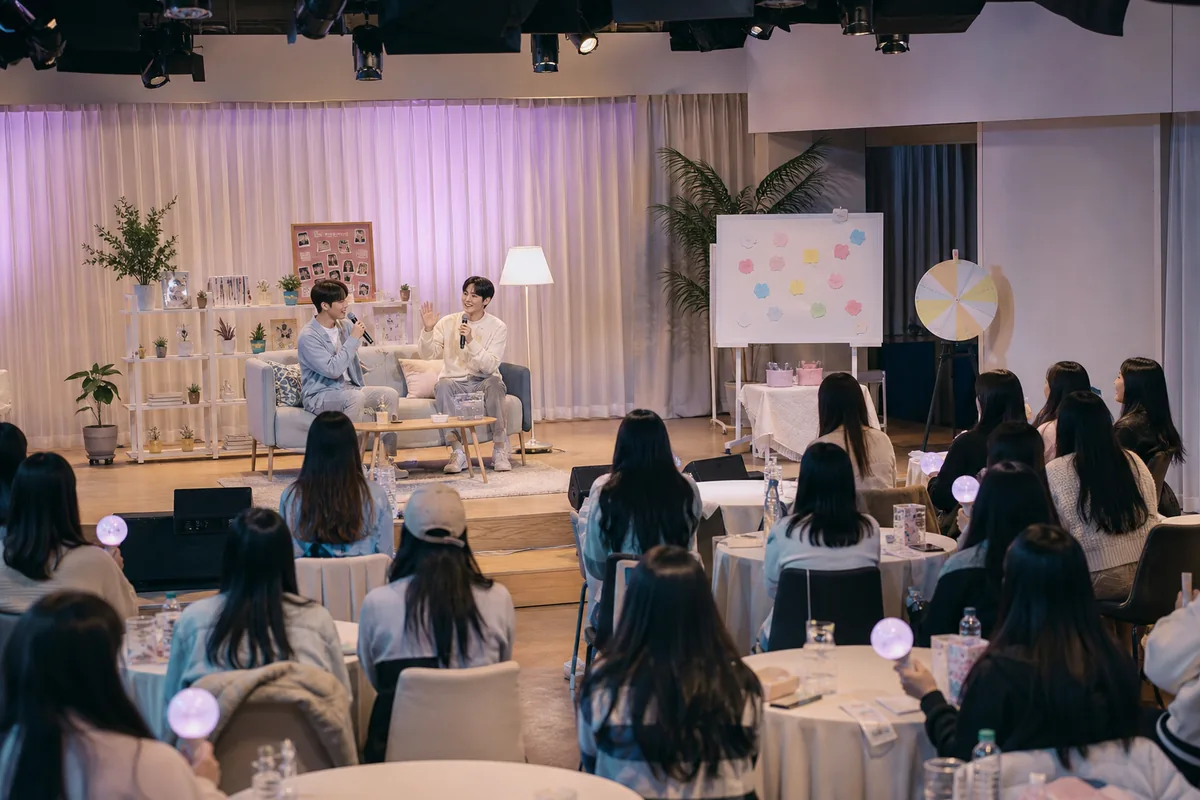 fan meeting vs concert smaller K-pop fan meeting stage with talk segment setup