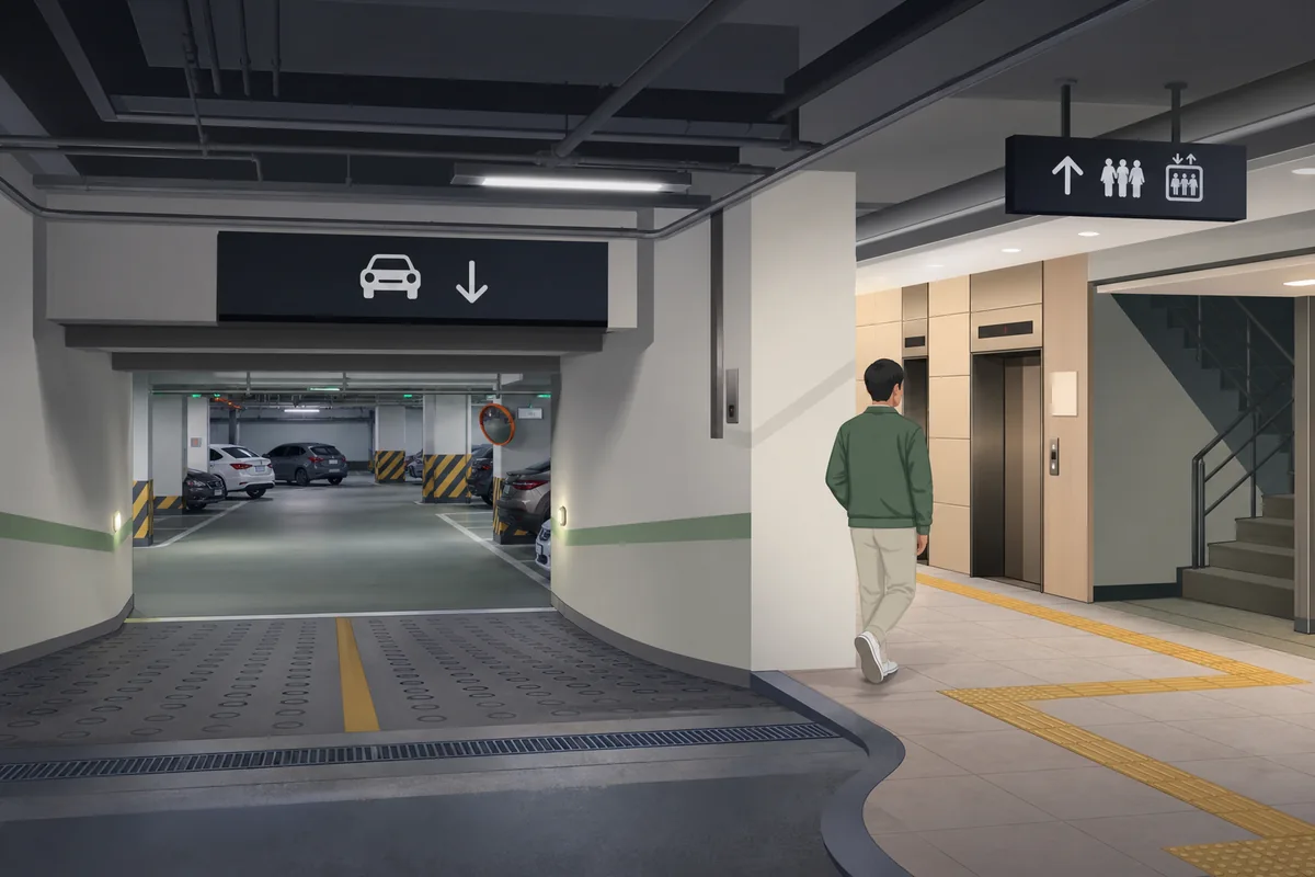 Underground parking entrance in a korean apartment complex with directional signs