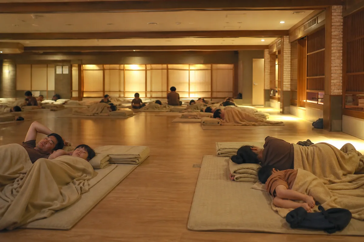quiet jjimjilbang sleeping lounge with mats and pillows