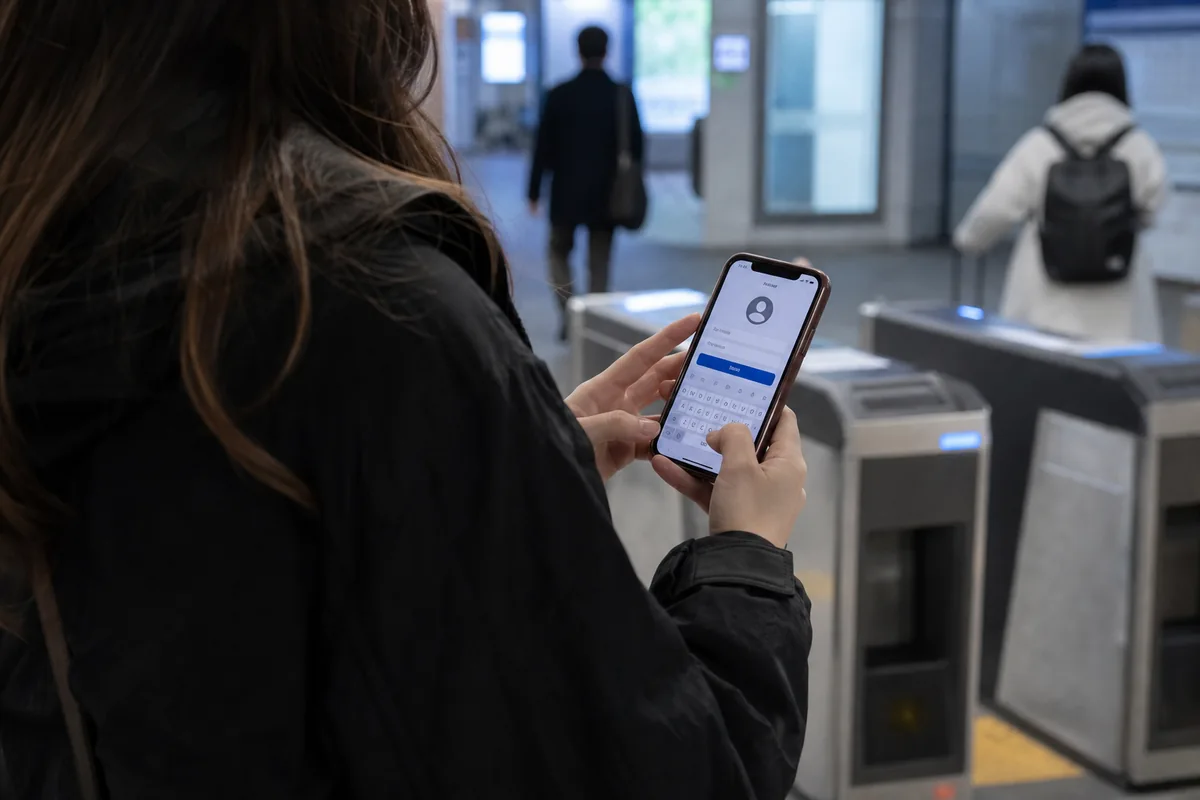foreign traveler preparing a KORAIL Talk account and payment method for chuseok 2026 ktx ticket sales